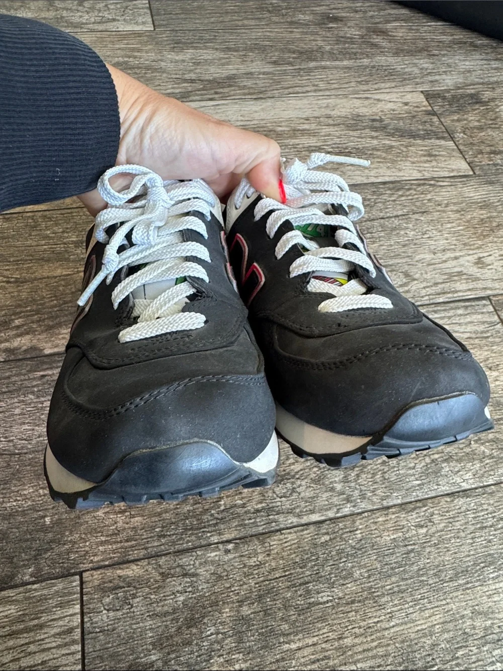 New Balance Black and White Sneakers with Pink Accents
